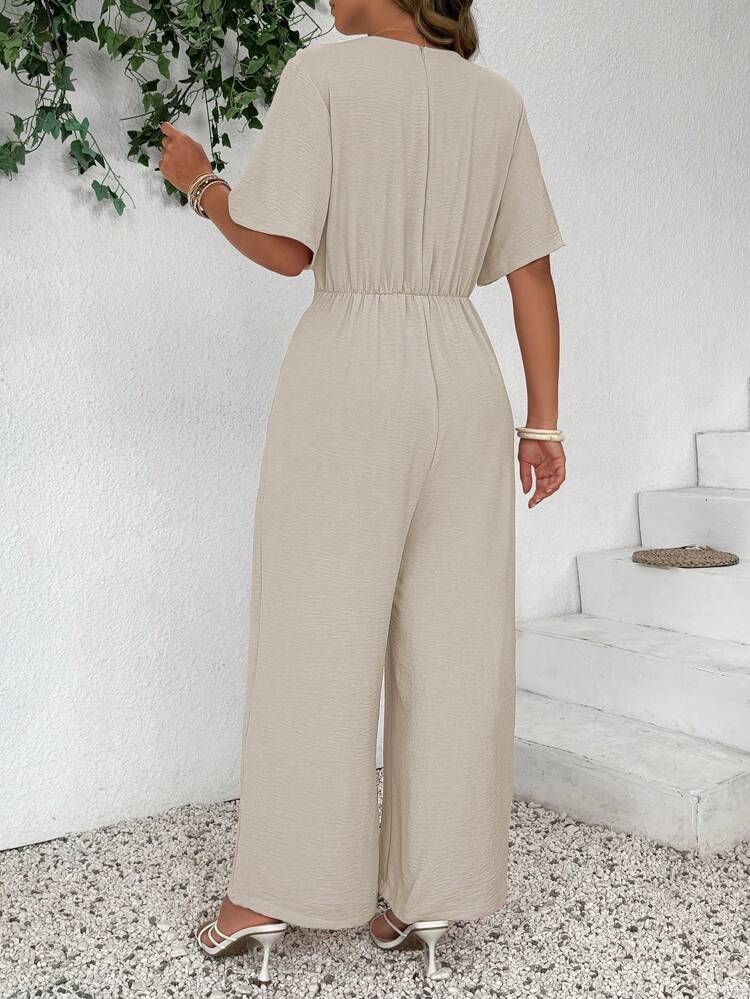 AURA – Mono Fluido con Nudo Frontal y Pierna Ancha